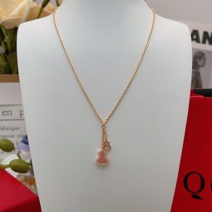 Elegant Gold and Pink Pendant Necklace